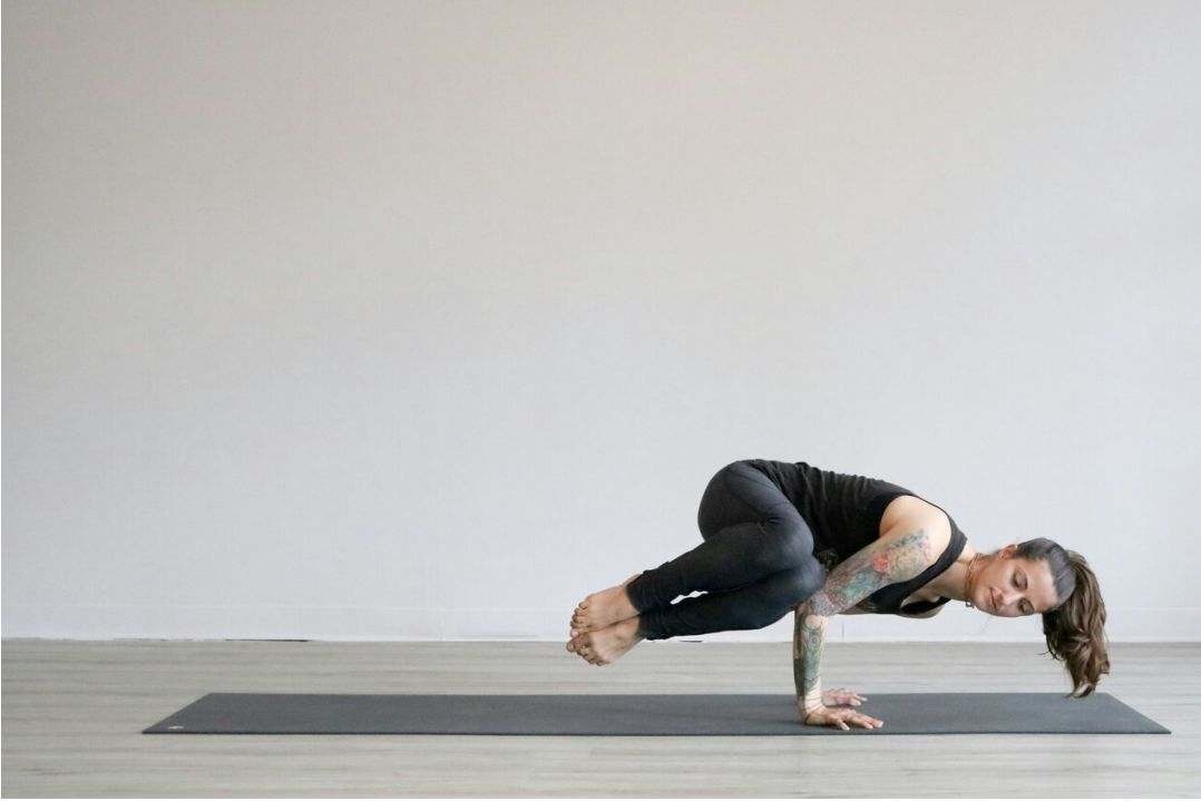 Pregnant woman practicing gentle yoga